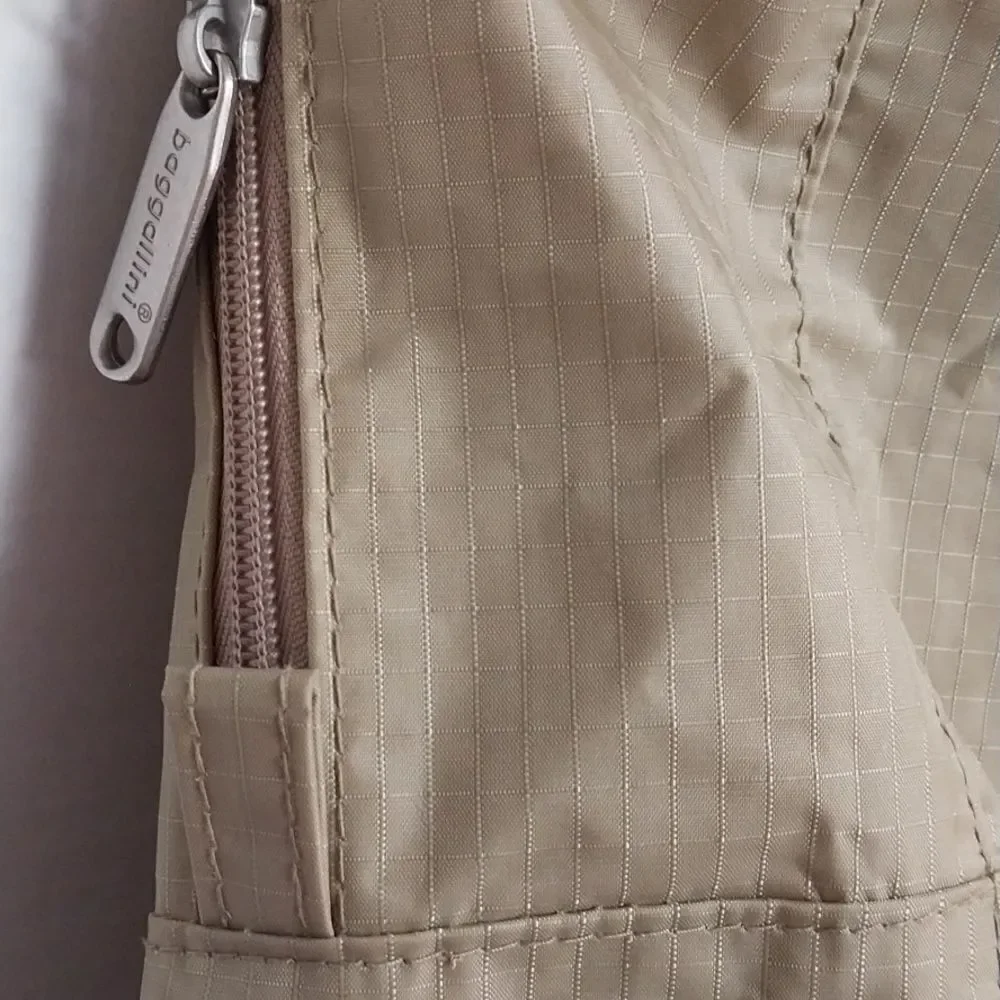 FOLDABLE Baggallini Tan Duffel Bag Spacious and Versatile